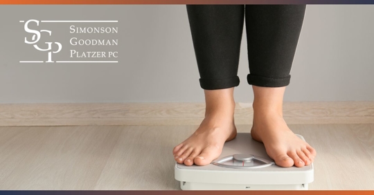 Woman's feet on a scale.